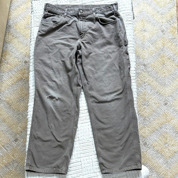 Carhartt distressed carpenter pants with some stains and holes. #10015 - Picture 1 of 11